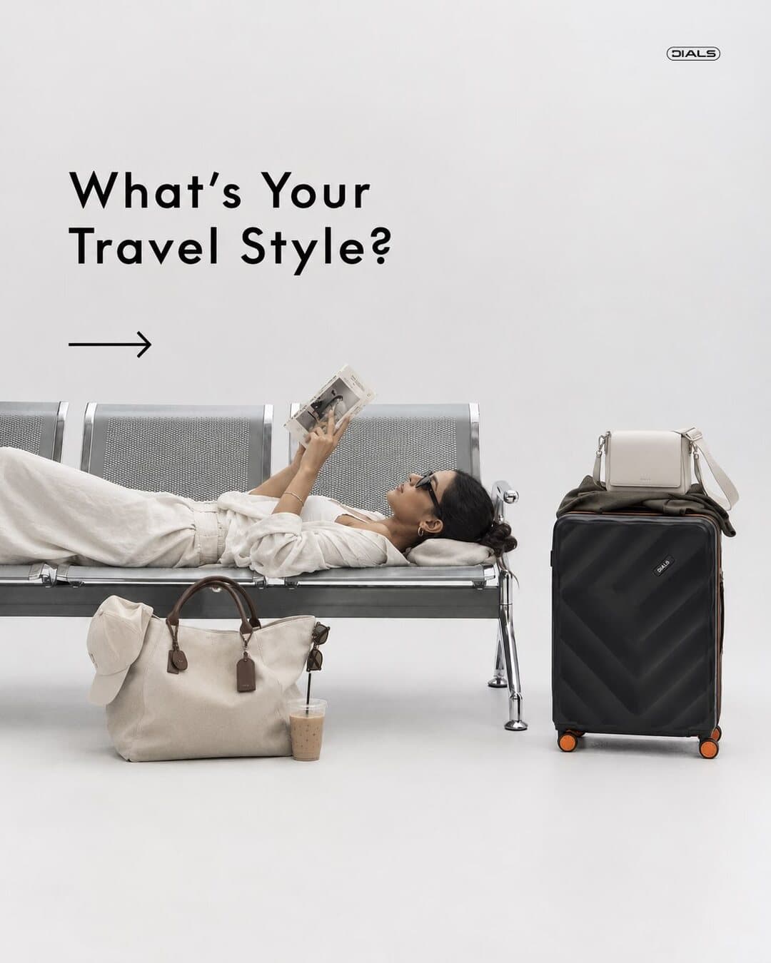 Dials post: “What’s your travel style?” A woman lies across airport seats reading, with a black case and a canvas tote beside her.